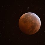 Eclipsed Moon And Uranus